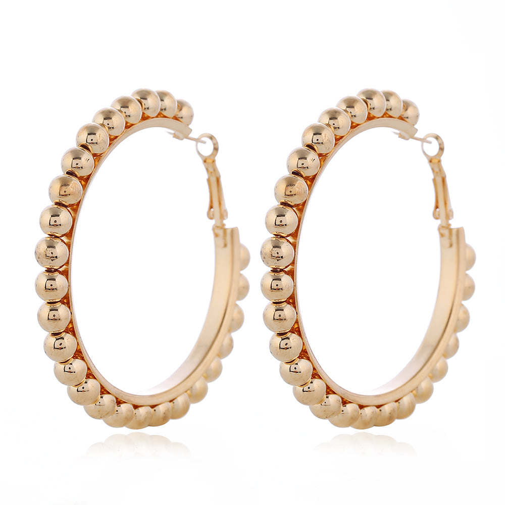 House of Royal Jasper beaded gold hoop earrings on plain background
