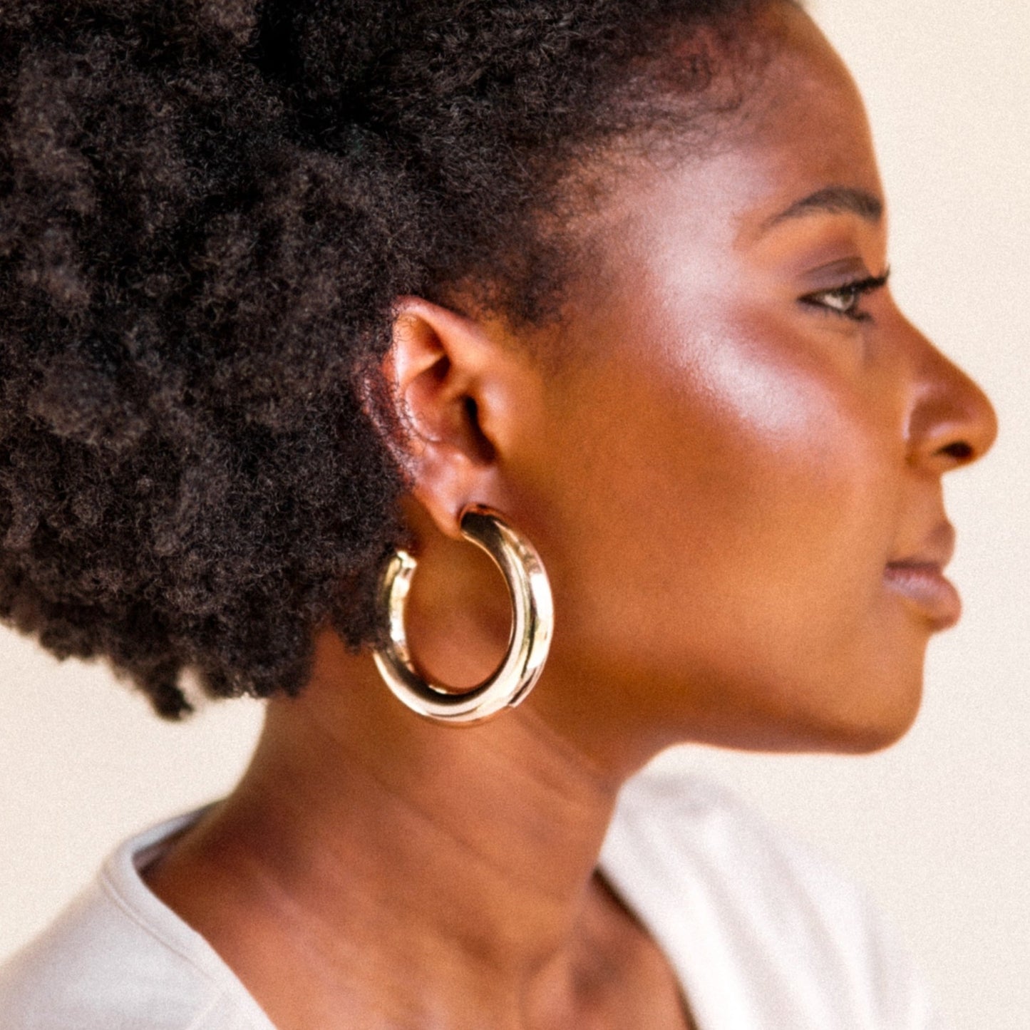 House of Royal Adira chunky gold hoop earrings on model