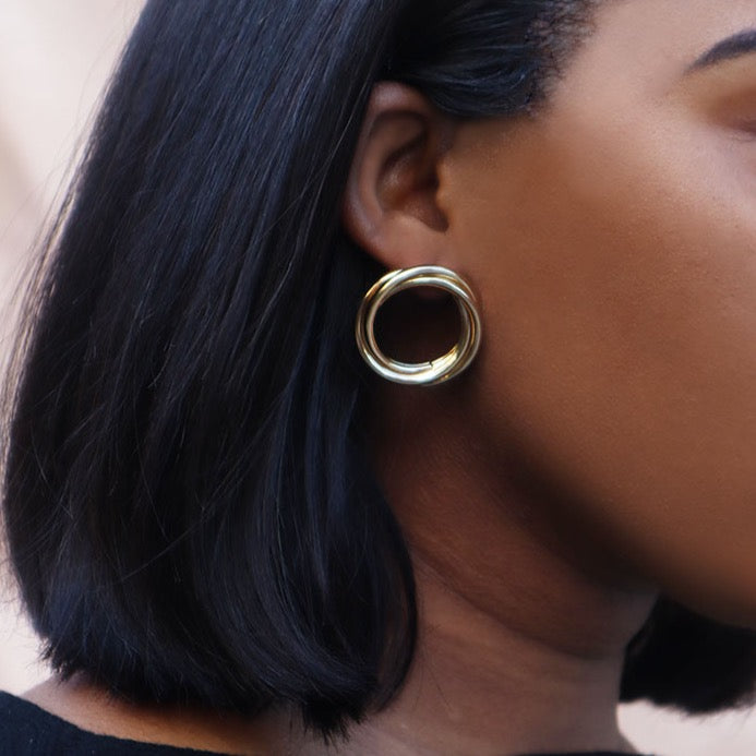 House of Royal Nara gold hoop earrings on model