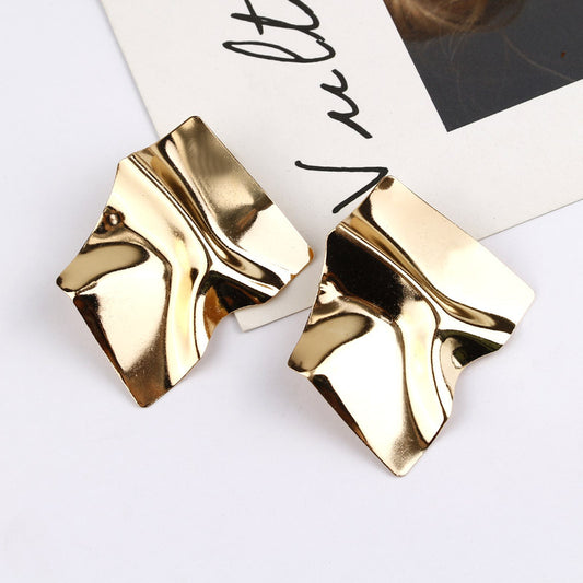 House of Royal Bernice abstract foil design statement gold earrings flat lay