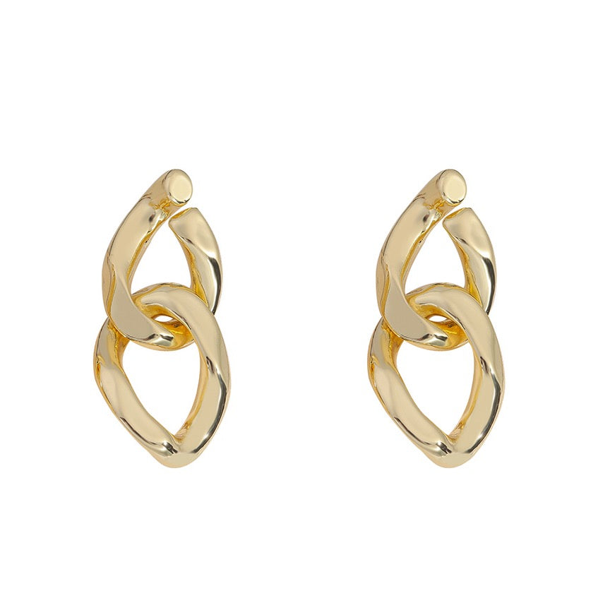 House of Royal Eva small cuban link gold earrings on plain background