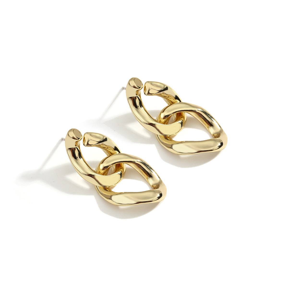 House of Royal Eva small cuban link gold earrings on plain background flat angled