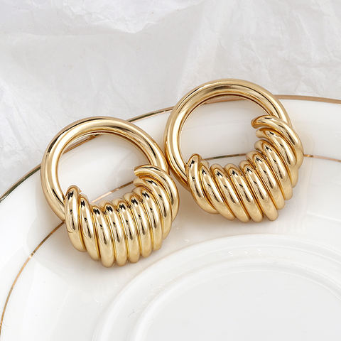 House of Royal Natania gold hoop earrings product image on plate