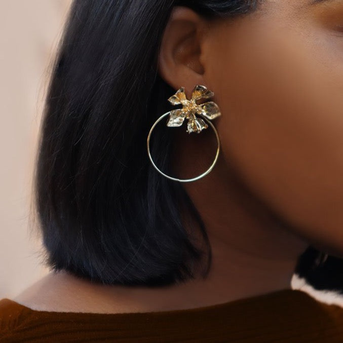 House of Royal Carmelle gold hoop earrings with flower product image on model